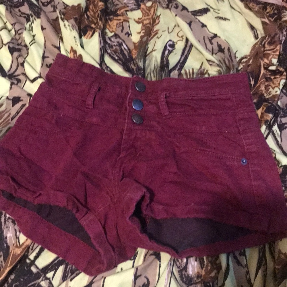 They are redish brown jean shorts 3 girls  form nobo
